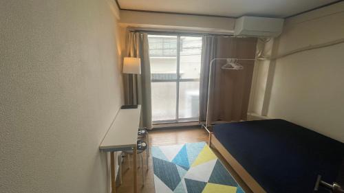 Two-Bedroom Apartment with Balcony