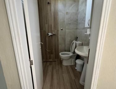 Triple Room with Balcony and Kitchen
