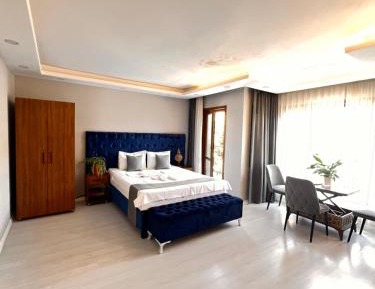One-Bedroom Apartment with Balcony and City View