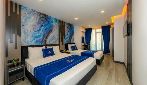 Deluxe Triple Room