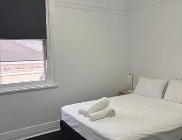 Queen Room with Shared Bathroom