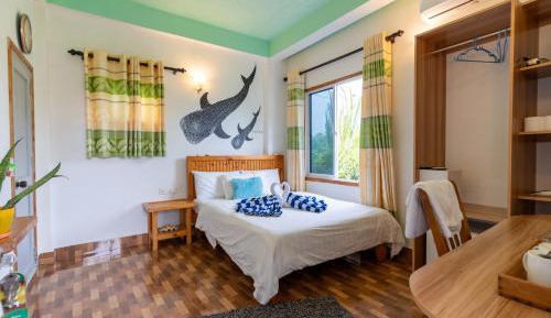 Queen Room with Garden View (10% off on Excursions, Food & Beverages)