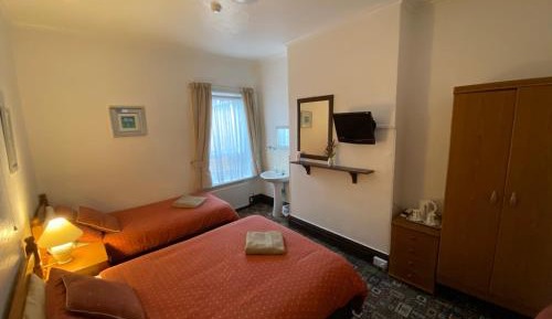 Deluxe Room (2 Adults + 1 Child)