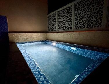 Quadruple Room with Private Bathroom