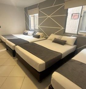 Quadruple Room with Private Bathroom