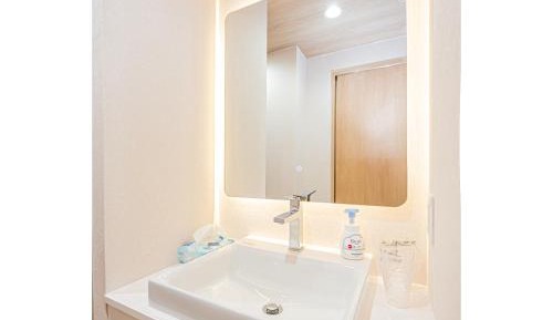 Three-Bedroom Premium Apartment with Balcony