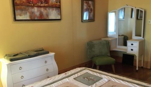 Queen Room with Shared Bathroom