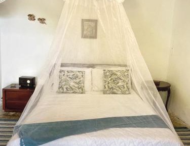 Queen Room with Shared Bathroom