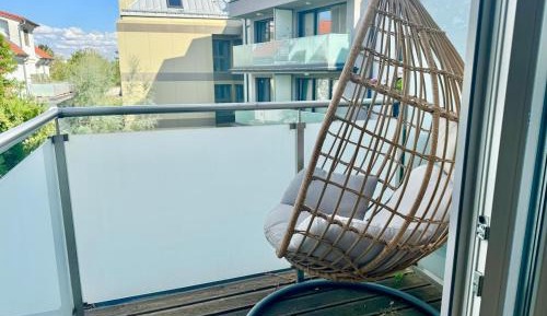 Four-Bedroom Apartment with Balcony 
