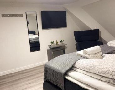 Queen Room with Shared Bathroom