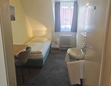 Single Room with Shared Shower and Toilet