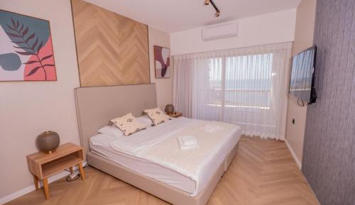 One-Bedroom Apartment with Balcony and Sea View