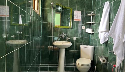 Quadruple Room with Private Bathroom