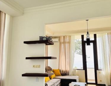 One-Bedroom Apartment with Sea View and Balcony