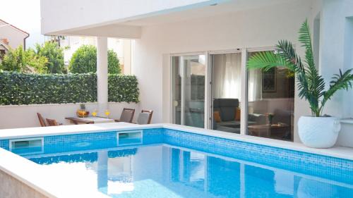 Three-Bedroom Apartment with Private Pool