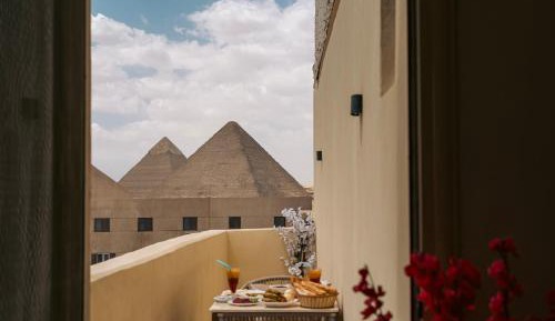 Triple Room with Balcony Pyramids view 