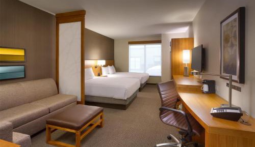 Queen Room with Two Queen Beds and Sofa Bed