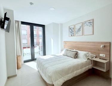 One-Bedroom Apartment with Balcony and City View