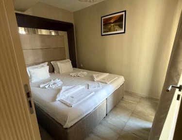 One-Bedroom Apartment with Balcony and Partial Sea View (2 Adults + 2 Children)