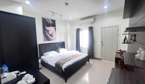 One-Bedroom Apartment with Balcony and City View