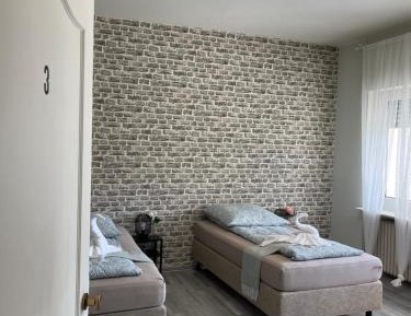 Triple Room with Shared Bathroom