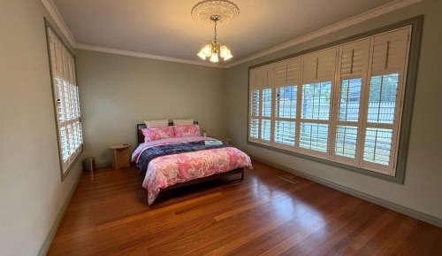 Queen Room with Shared Bathroom