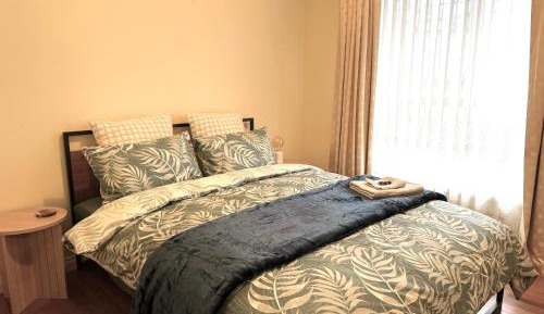 Queen Room with Shared Bathroom