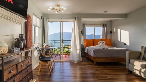 One-Bedroom Apartment with Balcony and Mountain View  
