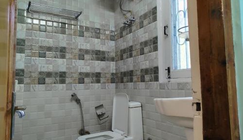Deluxe Room (2 Adults + 1 Child)
