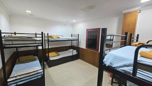 8-Bed Male Dormitory Room