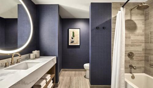 One Bedroom King Suite + Deluxe Room 2 Queen Beds