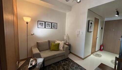 One-Bedroom Apartment with Balcony and City View