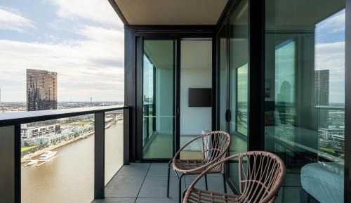 One-Bedroom Apartment + Study with River View
