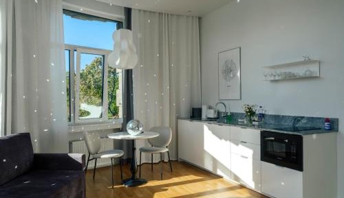 Deluxe One-Bedroom Apartment with Garden View