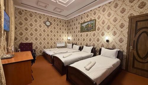 Quadruple Room with Private Bathroom