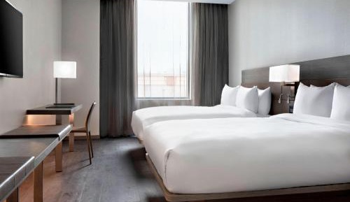 Queen Room With Two Queen Beds and City View - Hearing Accessible