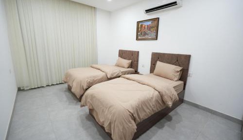 Two-Bedroom Apartment with Balcony