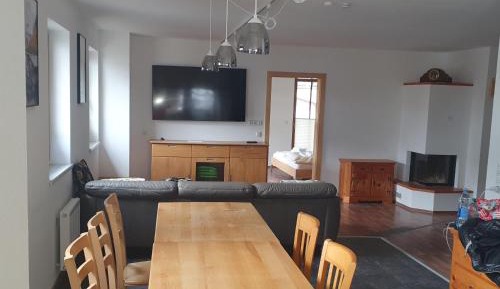 Four-Bedroom Apartment with Balcony 