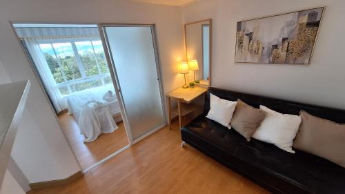 One-Bedroom Apartment with Balcony and Mountain View  