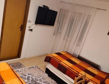 Quadruple Room with Private Bathroom