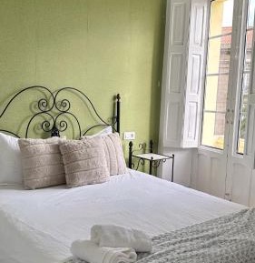 One-Bedroom Apartment with Balcony and City View