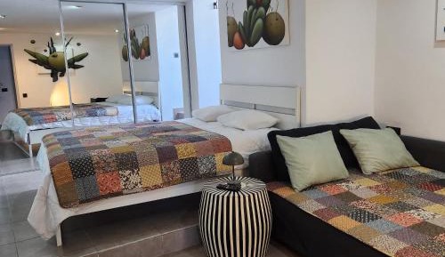 Quadruple Room with Private Bathroom