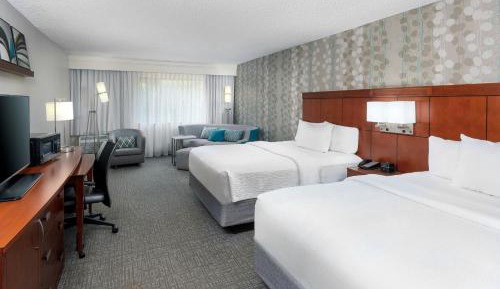 Guest Room with Two Queen Beds and Sofa Bed