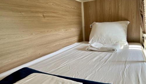 Female Only: One Privacy Pod Bed in a 2-Person-Max Female Only Shared Room 
