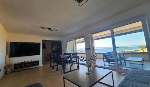 Two-Bedroom Apartment with Balcony and Sea View