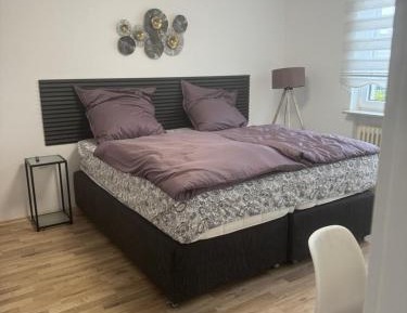 Four-Bedroom Apartment with Balcony 