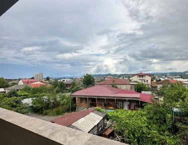 Two-Bedroom Apartment with Balcony