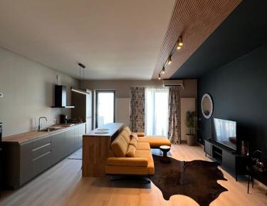 One-Bedroom Apartment with Balcony and City View
