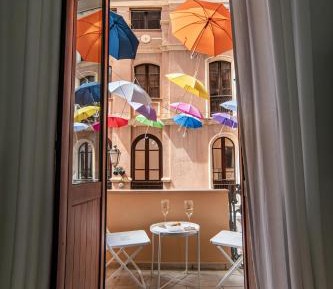 One-Bedroom Apartment with Balcony and City View