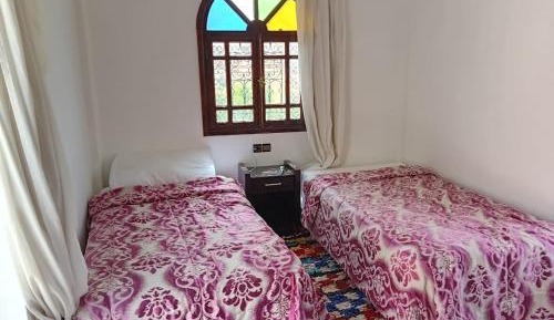 Economy Quadruple Room with Shared Bathroom